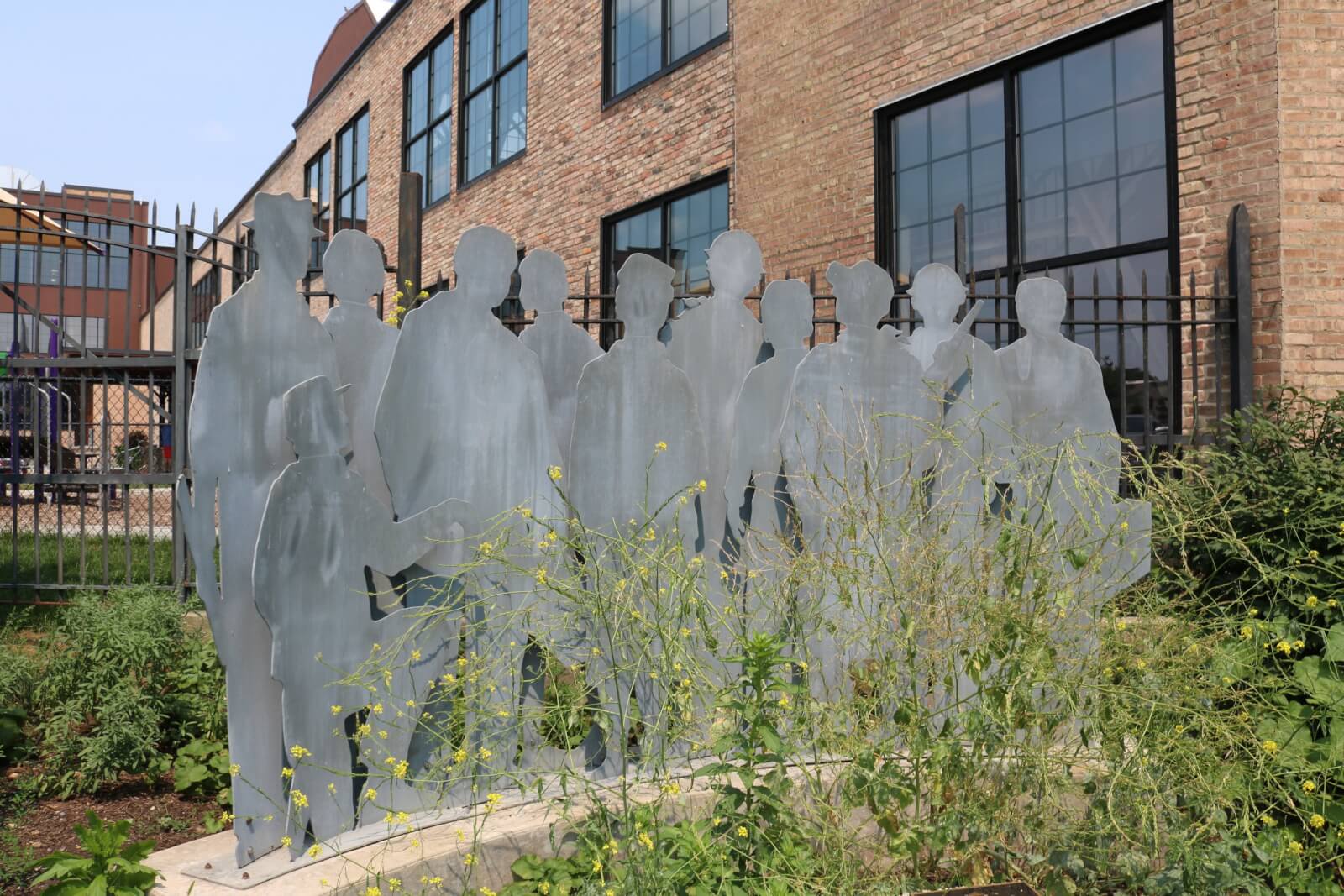 Passport Trails "The Workers" outdoor art sculpture in Beloit, WI.
